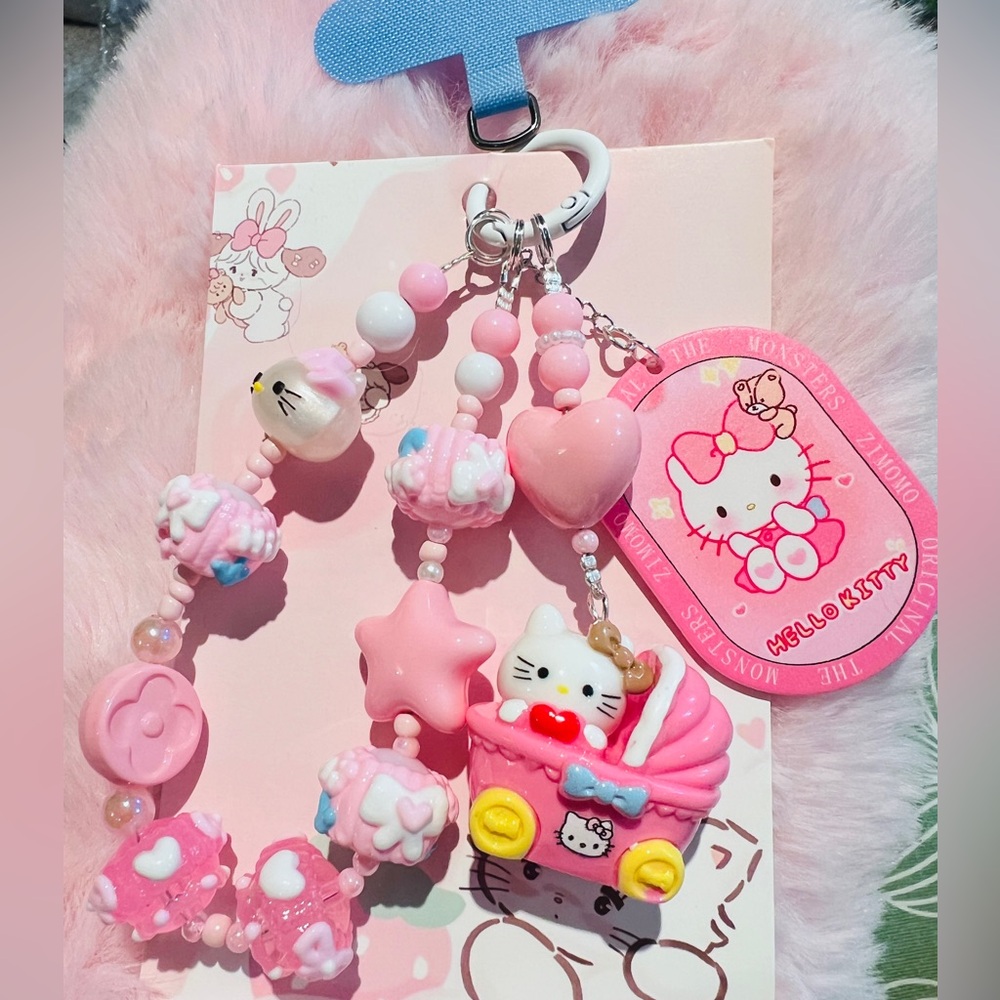 Buy 3 get 1 free❤️❤️Hello Kitty Pink and White Beaded Charm